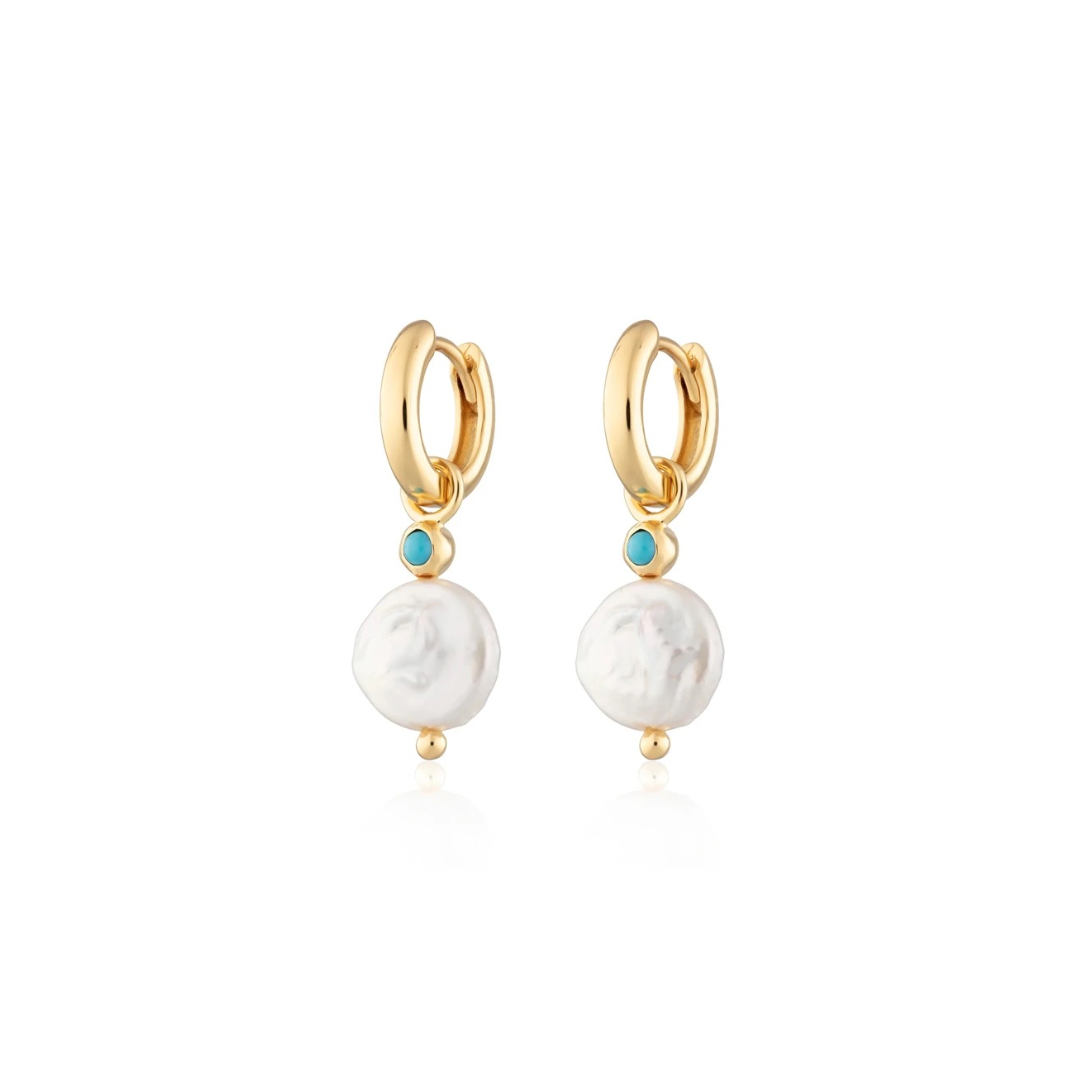 Baby Blue Pearl Hoops are gracefully designed earrings with small hoops, showcasing a charming baby blue color. The hoops are adorned with lustrous pearls, adding a touch of elegance to this delightful accessory. Perfect for both casual and formal occasions, these earrings effortlessly combine sophistication with a subtle pop of color.
Material: 925 Sterling Silver + gold plated 18K
Measurments: 5.3 x 21.3mm
