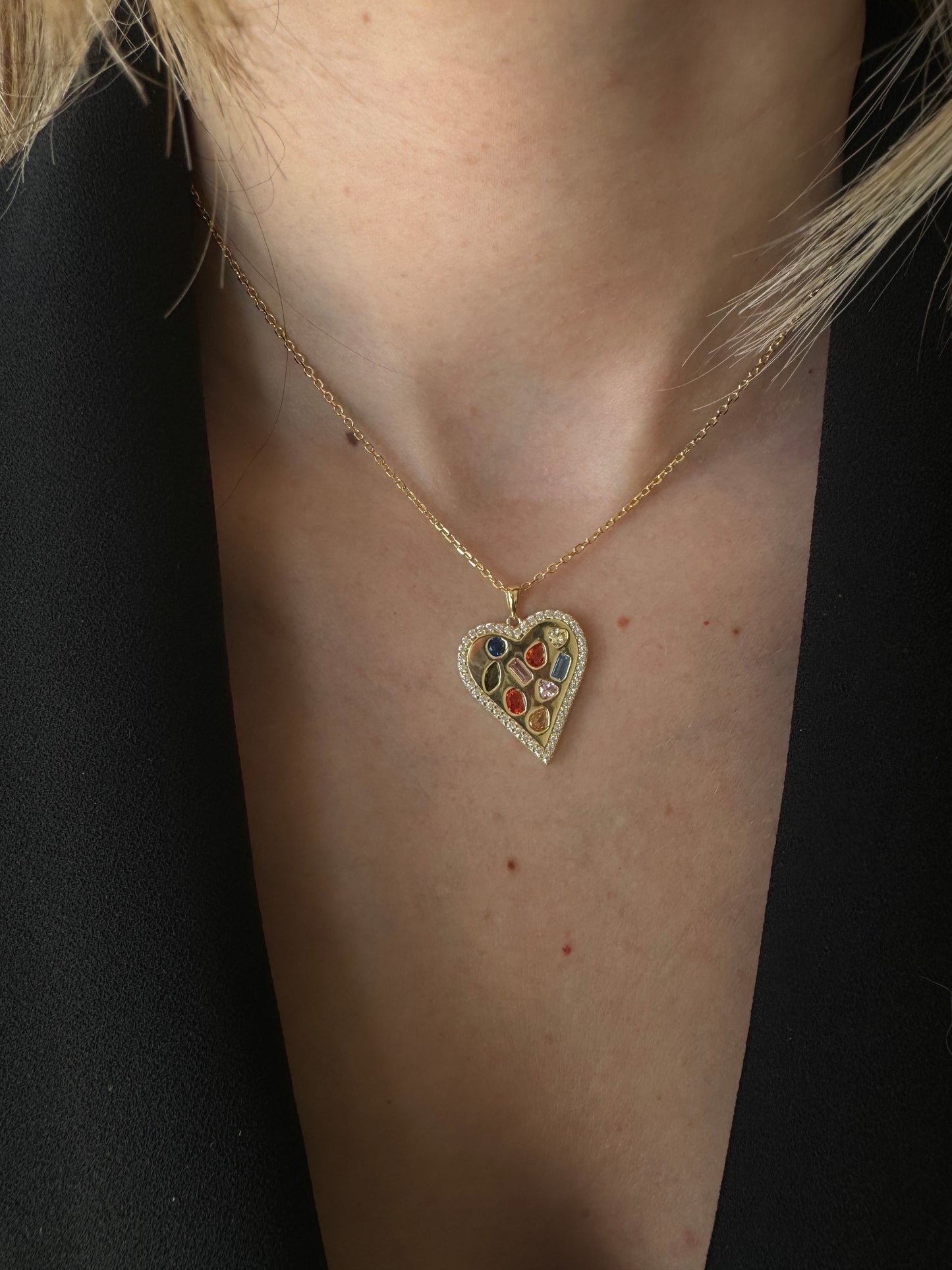 Fall in love with our Rainbow Figured Heart Necklace.
This playful necklace features a rainbow colored heart pendant, adding a pop of color to any outfit. Share your love and show off your unique style with this quirky and fun necklace.
Perfect for those who love to stand out and make a statement (without trying too hard)!
Material: Sterling silver .925 + 18K gold plated
Measurements: 15.80 in + 2.00 in pendant: .95 x .80 in