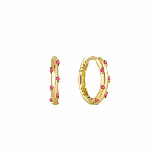 Add a splash of color to your daily routine with our Red Yoli Hoops! These playful hoops are sure to brighten up any outfit and put a smile on your face.
The combination of the gold color and the red stone creates a harmonious and eye-catching piece, suitable for both casual and more formal occasions.
Material: .925 Sterling Silver + 18K gold plated
Measurments: