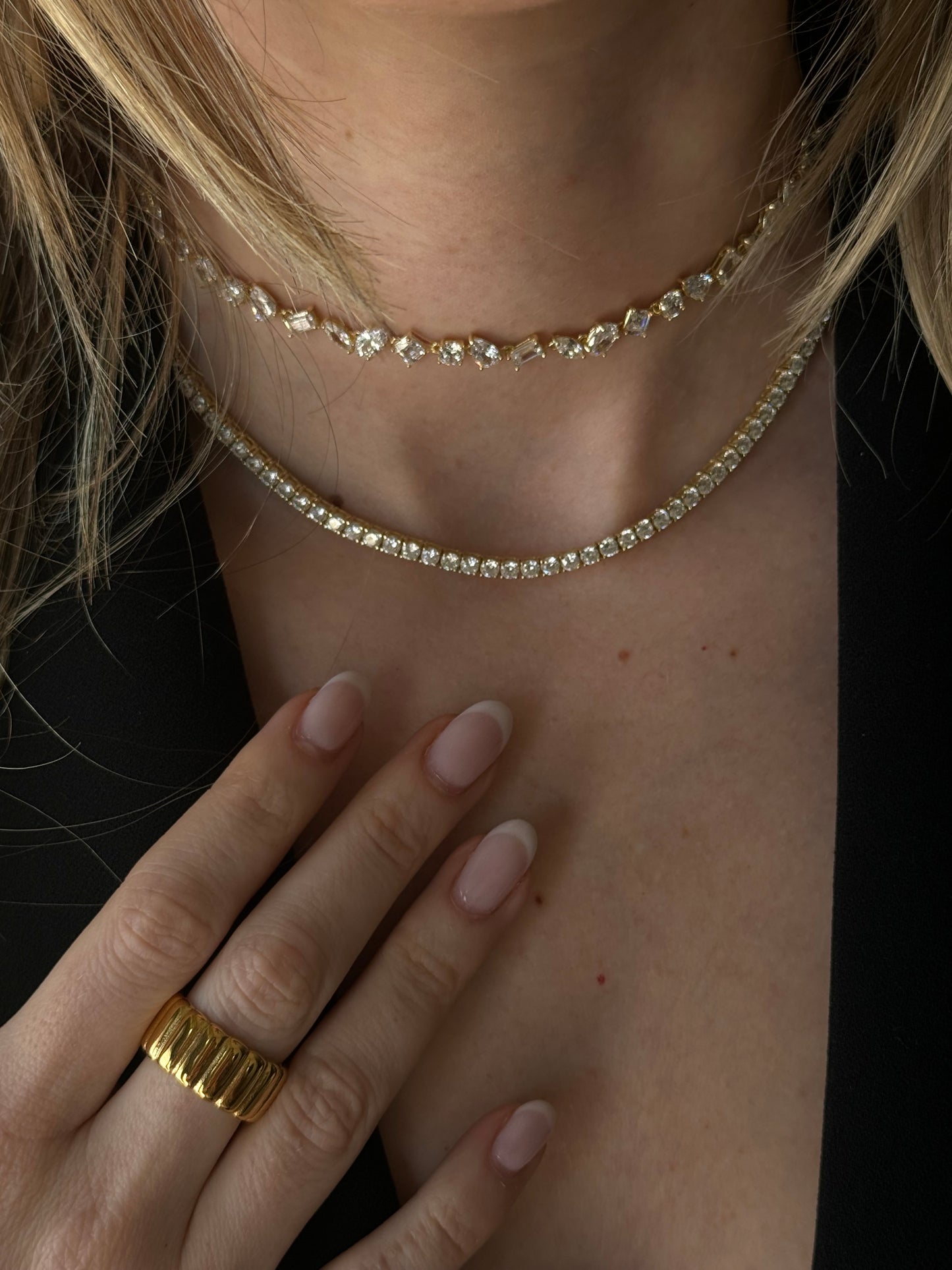 Elevate your jewelry game with our TENNIS GOLDEN NECKLACE! This classic trend will add a touch of elegance to any outfit. A must-have accessory for any fashion-forward individual.
Classic, classic, classic. Everyone needs the perfect tennis necklace in their layering game.
Material: Sterling silver .925 + 18K gold plated
Measurements: 16.5 in thickness: .10 in