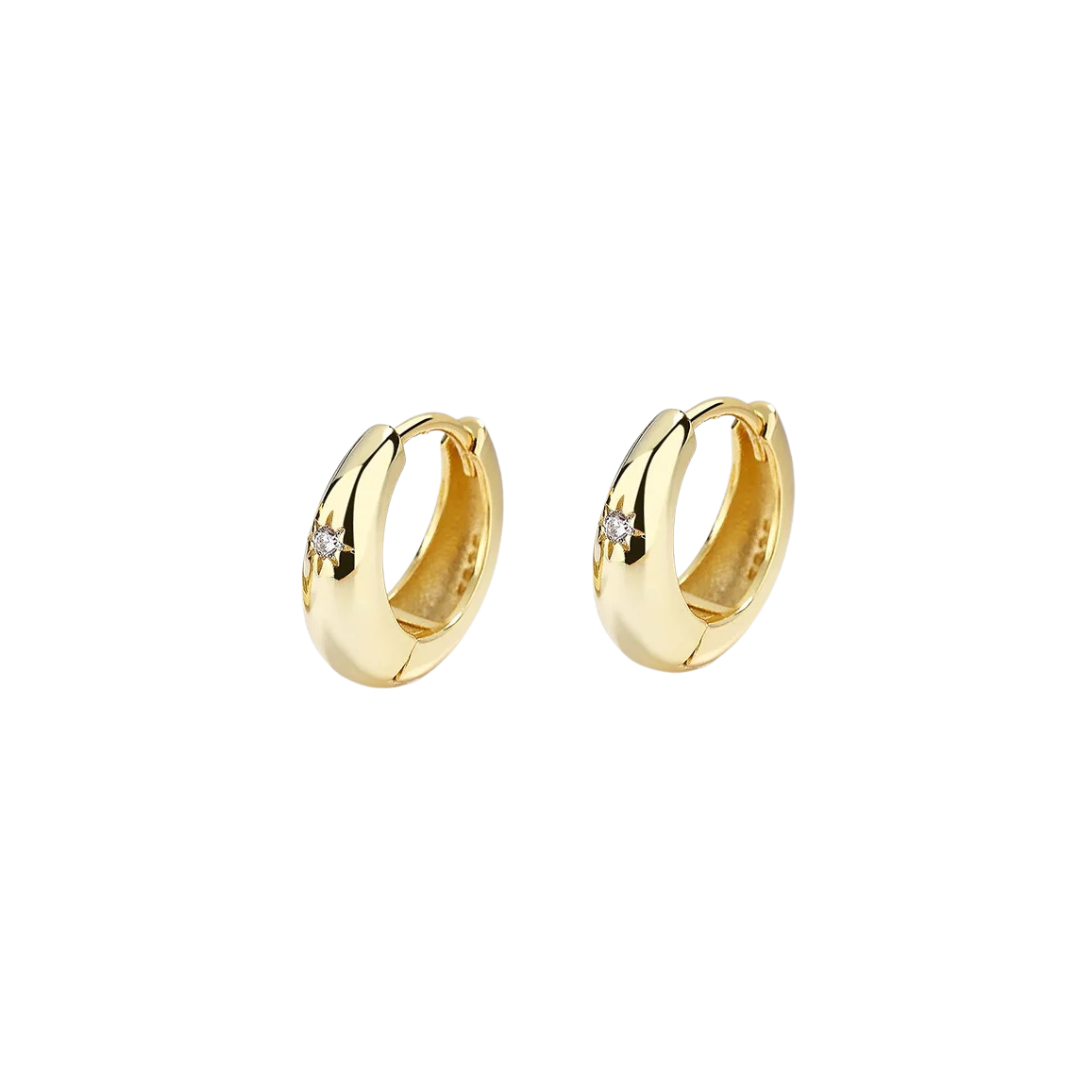 Get your ears' moneys worth with these delightful Kim Hoops. Their golden color adds a touch of luxury, while their playful design will surely make a statement. Don't miss out on this unique addition to your jewelry collection!