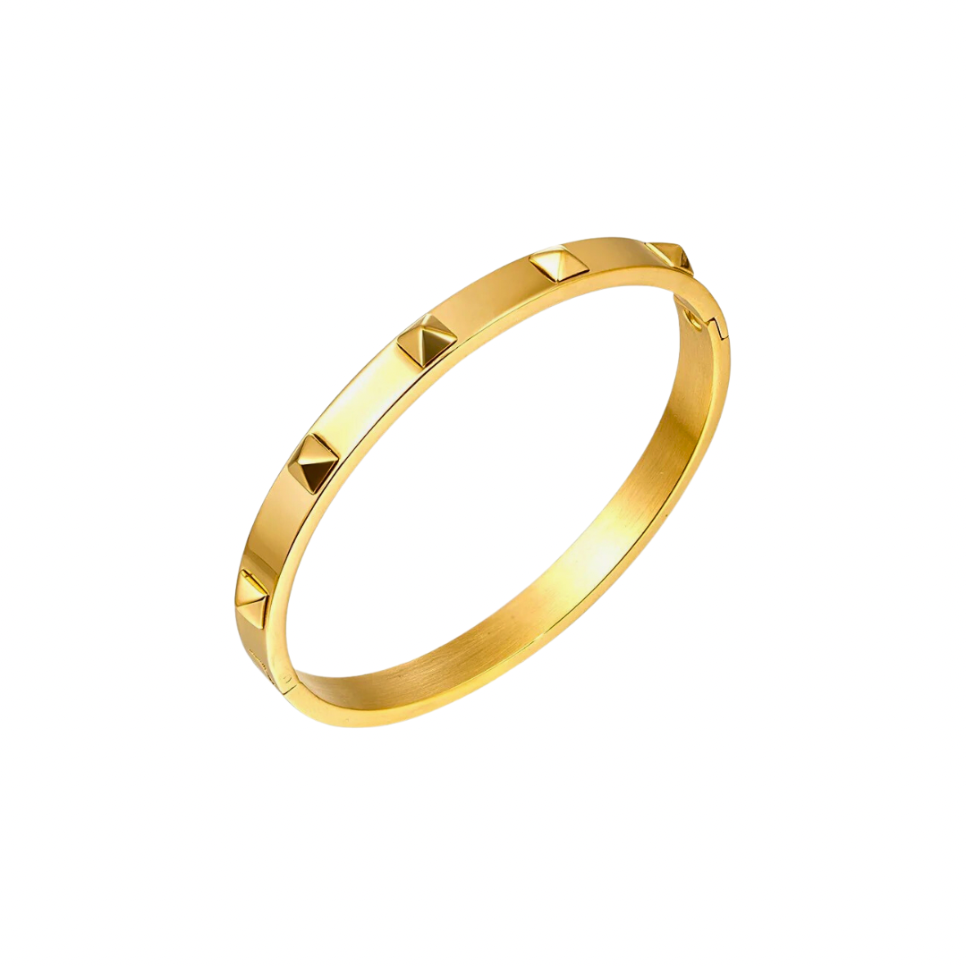 This elegant PYRAMID GOLDEN BRACELET features intricate pyramid figures in shimmering gold. Crafted with expert precision, this stunning bracelet is sure to make a statement and add a touch of sophistication to any outfit. Make a bold and stylish statement with this must-have accessory.
Material: 100% brass 18k gold plated
Measurements: 2.45 x 2.2 in