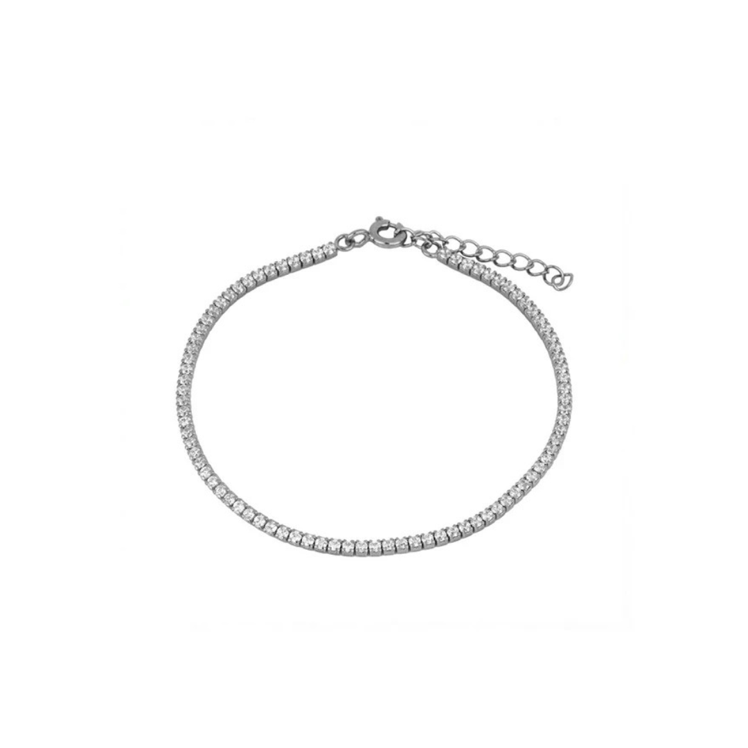 Hit the fashion court with our trendy yet classic Tennis bracelet. Serving up a chic look that will elevate any outfit, this necklace is sure to be a smash hit. Durable and stylish, it's a grand slam of a piece.
A classic everyone needs the perfect tennis bracelet in the stacking game.
Material: .925 Sterling Silver + 18K gold plated
Measurements: 6.5 in + 1.00 in