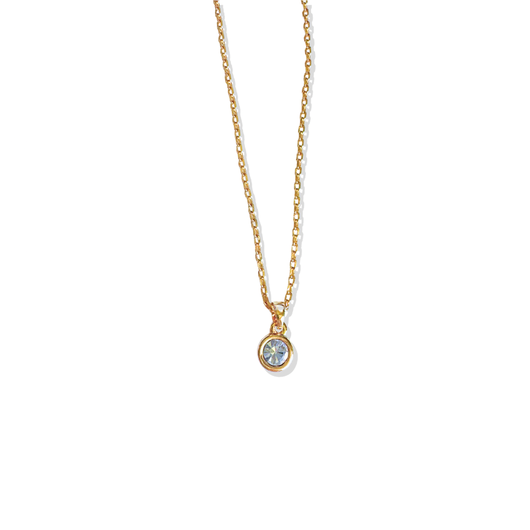 Clear solitaire crystal gold necklace
Minimalist pendant necklace
Delicate clear stone necklace on model