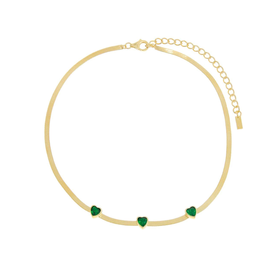 Slither your way into someone's heart with our Emerald Heart Snake Necklace! This stunning piece features a charming snake design with a sparkling emerald heart at the center. A unique and playful addition to any jewelry collection. (Warning: may cause extreme envy from friends)
 
Material: Sterling silver .925 + 18K gold plated
Measuerments: 1.8 x 1.6 cm