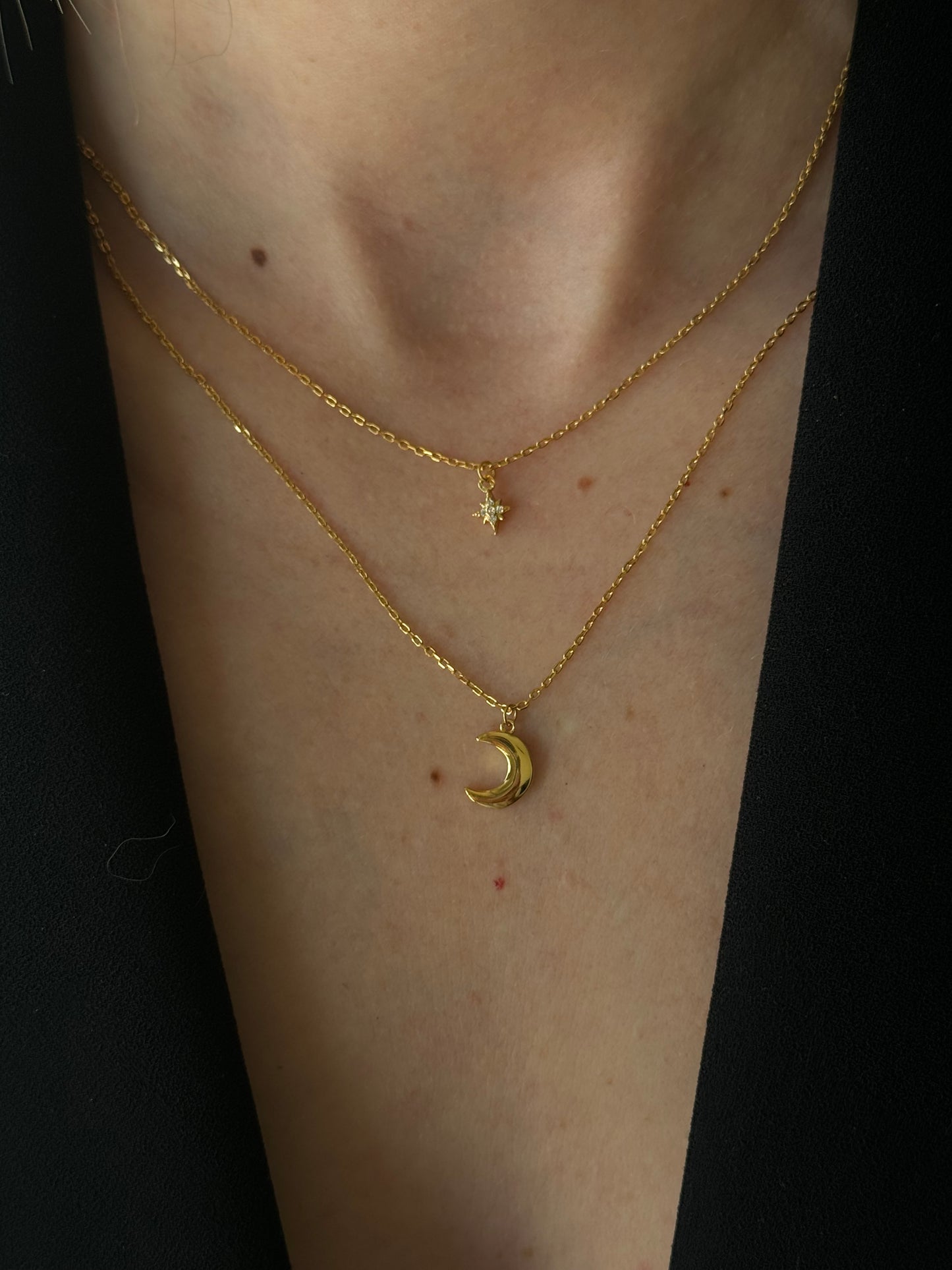 Shimmer in style with our DOUBLE LAYER SUN AND MOON GOLDEN NECKLACE.
A playful way to embrace the power of manifestation affirmations, this necklace features a double layer design with a sun and moon charm.
Perfect for adding a touch of whimsy to any outfit!
Unleash the power of your YOUniverse… and look HOT doing it.
Material: 925 Sterling Silver + gold plated 18K
Measurements: 15.60 in
Height between layers with pendant: 1.80 in
