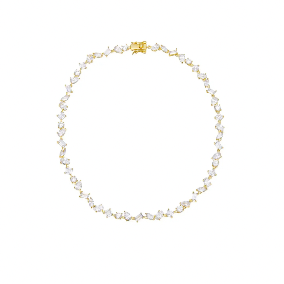 Hit the fashion court with our trendy yet classic Tennis necklace. Serving up a chic look that will elevate any outfit, this necklace is sure to be a smash hit. Durable and stylish, it's a grand slam of a piece.
Classic, classic, classic. Everyone needs the perfect tennis necklace in their layering game.
Material: Sterling silver .925 + 18K gold plated
Measurements: 12.4 in