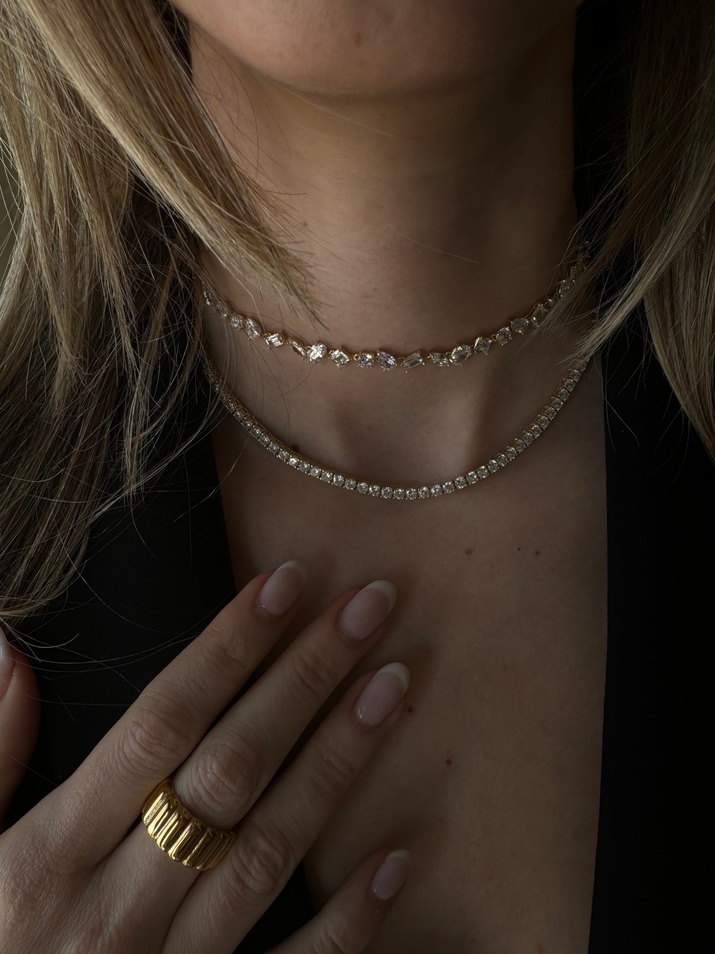Hit the fashion court with our trendy yet classic Tennis necklace. Serving up a chic look that will elevate any outfit, this necklace is sure to be a smash hit. Durable and stylish, it's a grand slam of a piece.
Classic, classic, classic. Everyone needs the perfect tennis necklace in their layering game.
Material: Sterling silver .925 + 18K gold plated
Measurements: 12.4 in