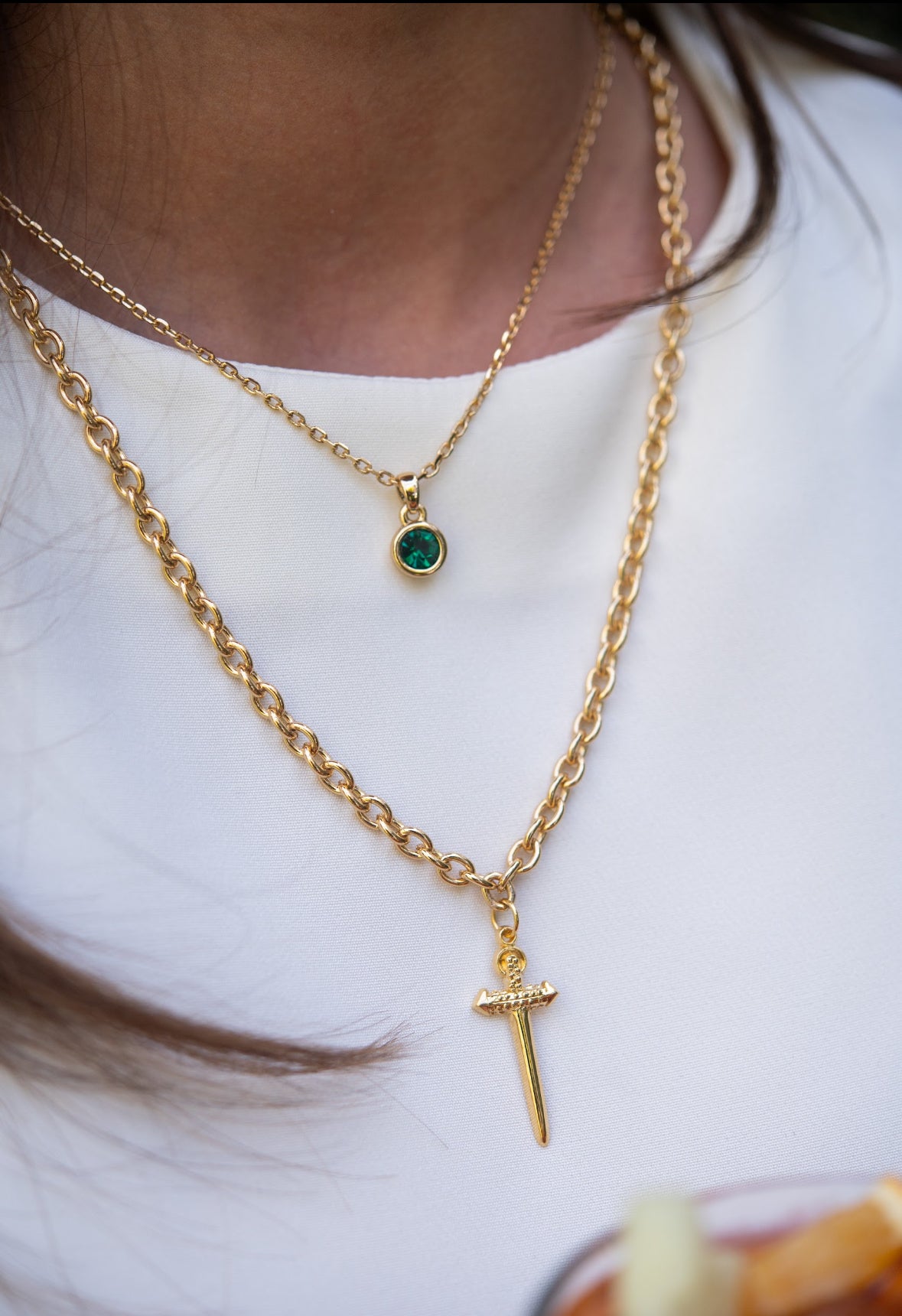 Green crystal gold necklace
Dainty pendant necklace for layering
Close-up of green gemstone necklace