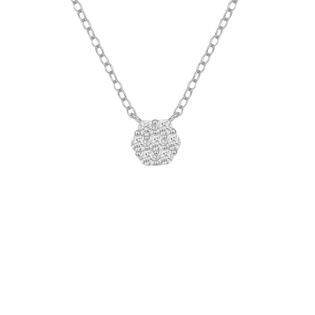 This delicate flower necklace features a stunning silver flower pendant, adding a touch of elegance to any outfit.
Material: .925 Sterling Silver + CZ
measurements: 15.50 + 2.0 in pendant: .20 x .20 in