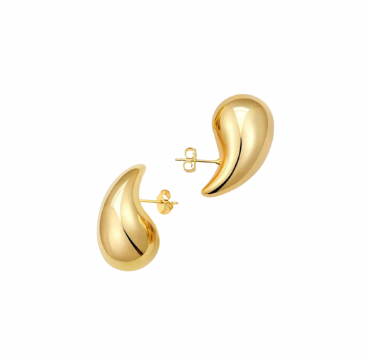 Introducing our new iconic teardrop earrings, the perfect accessory to elevate any outfit! Made with high-quality materials and exquisite craftsmanship, these earrings are designed to make a statement and leave a lasting impression.
Bottega Veneta teardrop Dupes
Hailey Bieber 
thick hoop earrings  the most in-demand and chunky styles
Material: Stainless Steel + 18K gold plated
measurements: 1.25 x .65 in