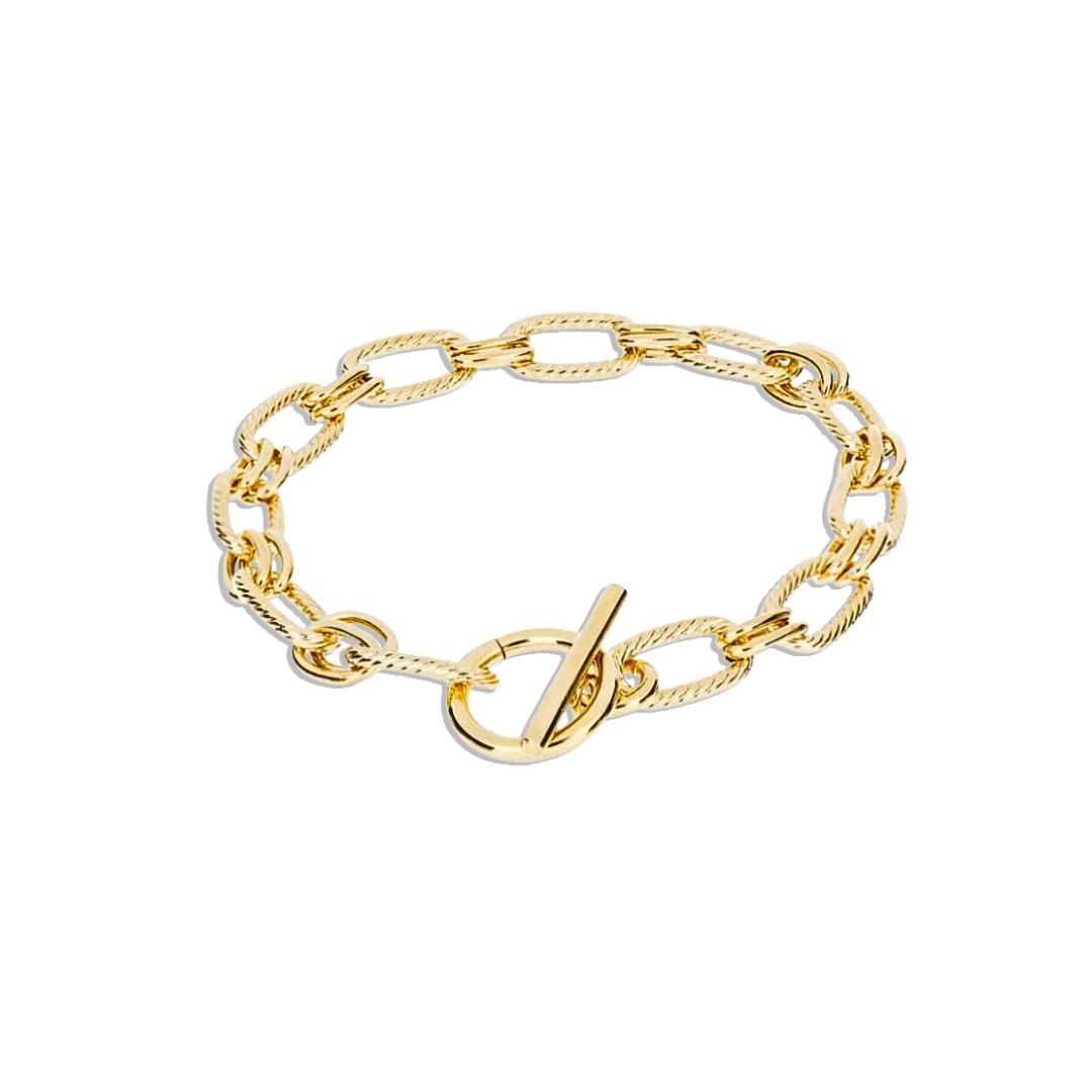 Get ready to make a statement with our Imperial Chain Bracelet! This bold and elegant piece features a toggle closure and a stunning gold color. Elevate any outfit and feel confident and stylish with this must-have accessory.