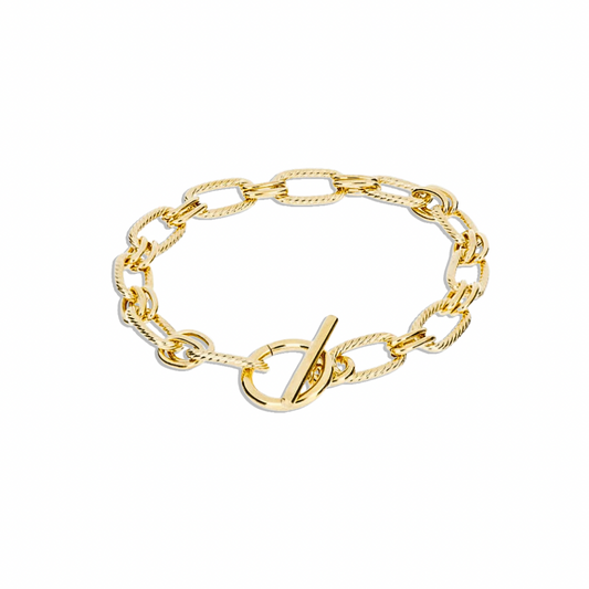 Get ready to make a statement with our Imperial Chain Bracelet! This bold and elegant piece features a toggle closure and a stunning gold color. Elevate any outfit and feel confident and stylish with this must-have accessory.