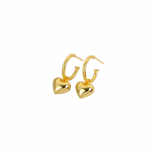 Add a touch of love to your wardrobe with our PUFFY HEART GOLDEN HOOPS. 
Show off your quirky side and spread some love with these golden hoops!
Material: 925 Sterling Silver + gold plated 18K
measurements: .65 in x .45 in