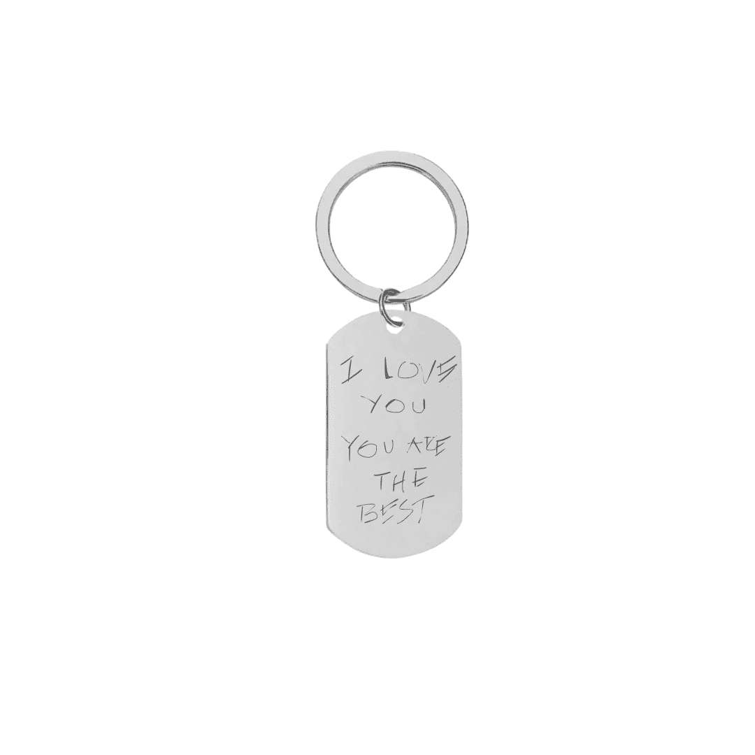 A rectangular silver keychain with engraved text 'I love you you are the best' on a white background.