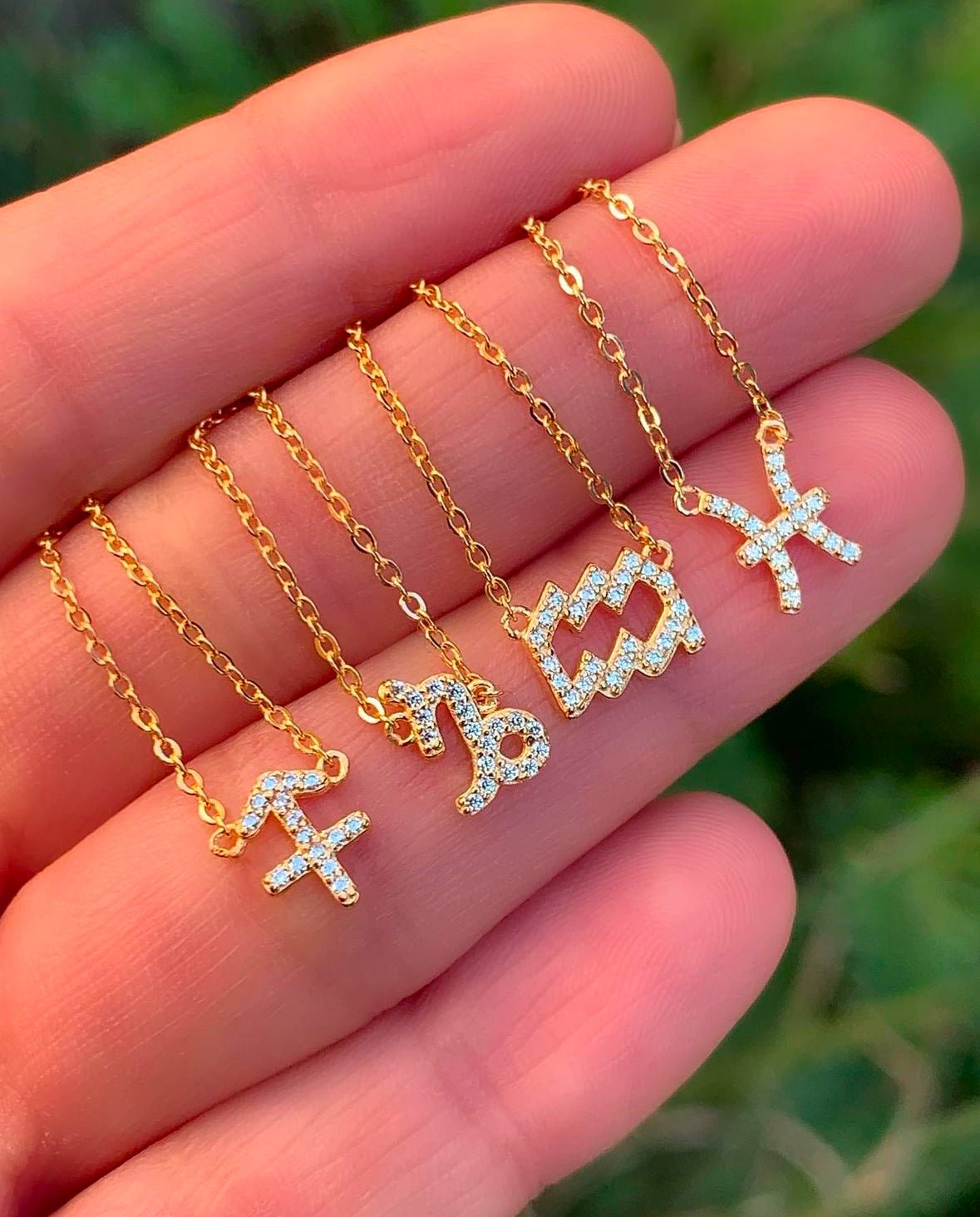Close-up of Sagittarius zodiac pendant detail in 14K gold-plated sterling silver