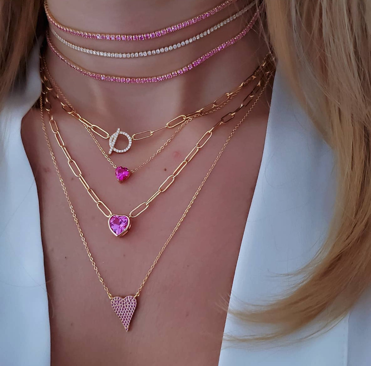 Show your love for the game with our Tennis Heart Necklace! This beautiful necklace features a delicate heart pendant, adorned with a tennis racket and ball charm. Made with high-quality materials, this necklace is perfect for any tennis enthusiast. Stay stylish on and off the court with this must-have accessory!