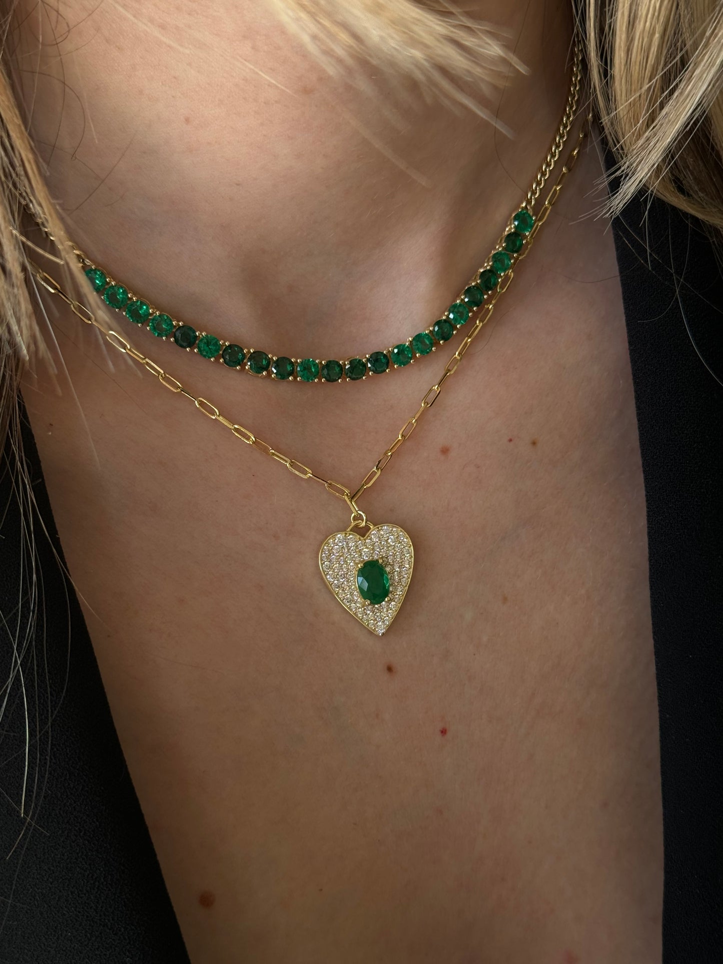 Add a touch of love to your look with our EMERALD HEART FIGARO NECKLACE.
This stunning necklace features a delicate figaro chain and a heart-shaped emerald pendant that adds a touch of whimsy to any outfit.
Perfect for adding a pop of color and charm to your look. Wear it alone or layer it with other pieces for a unique and playful look.
Material: Sterling silver .925 + 18K gold plated
Measurements: 17 in + 1.10 in pendant : .80 x .70 in