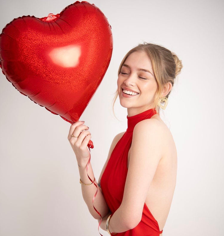 Shop The Love Shop for romantic gold-plated jewelry, heart necklaces, and pearl pieces made for modern love, gifting, and everyday styling.