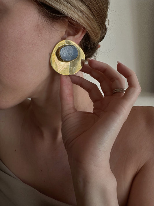 Lapis lazuli round earrings worn on ear