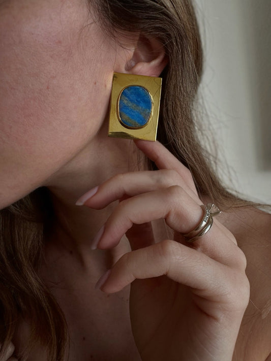 Lapis lazuli square stone earrings worn on ear