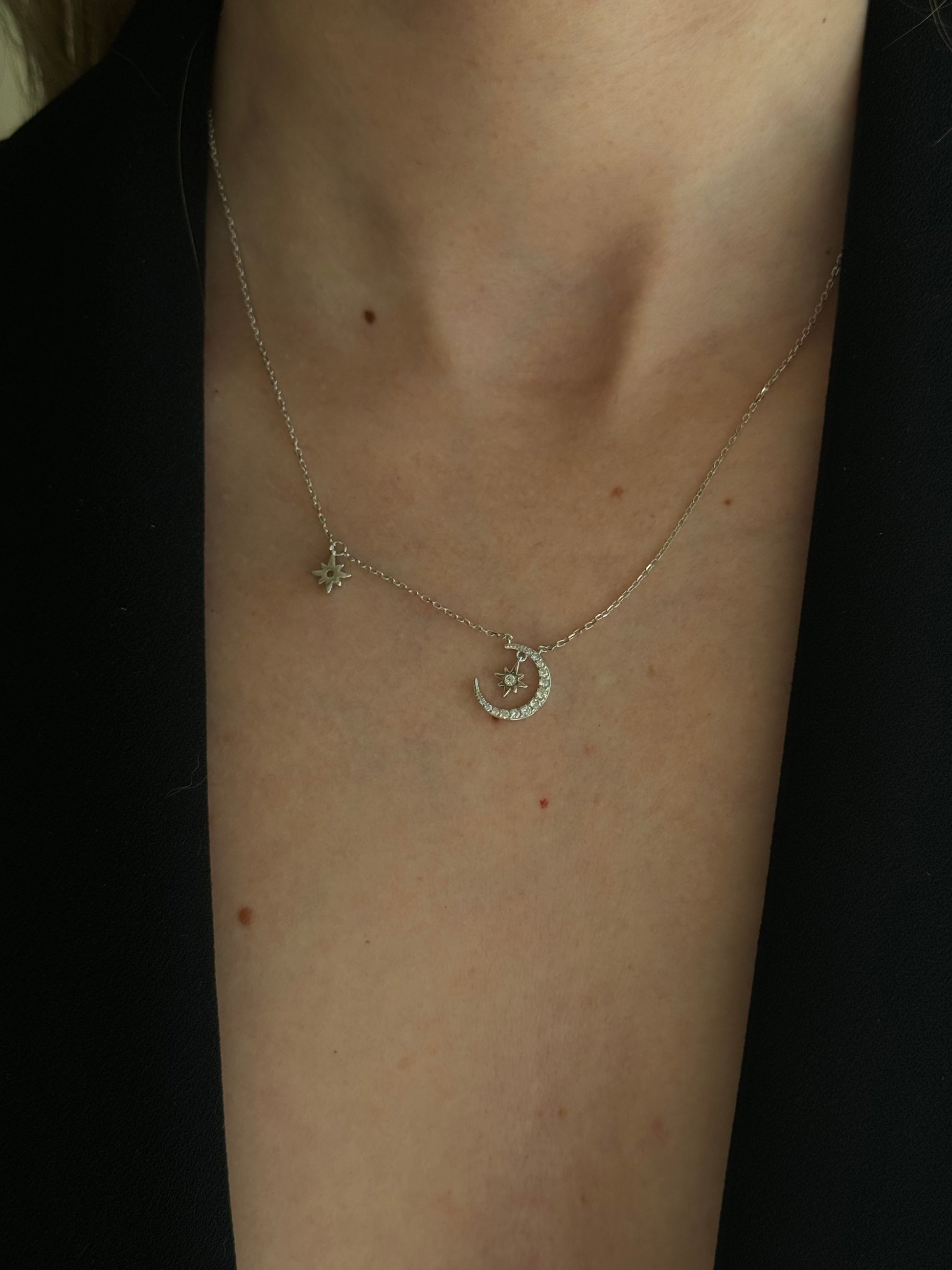 Unleash your inner goddess with our MOON DOUBLE STAR SILVER NECKLACE! This stunning necklace features a delicate moon and star design, adding a touch of celestial magic to any outfit. Elevate your style and shine like the stars with this unique and elegant accessory.


Material: 925 Sterling Silver

Measurements: 16.4 in + 1.5 in