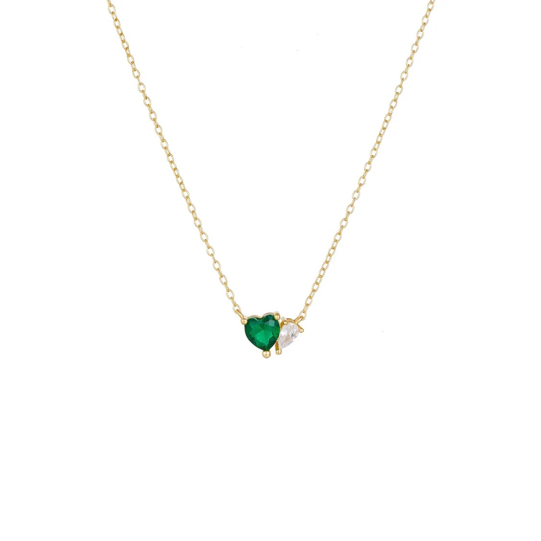 This green heart necklace necklace features a beautiful green heart pendant, symbolizing love and growth.

Show your loved one or a friend how much they mean to you with this heartfelt gift or treat for yourself.

Material: 925 Sterling Silver + gold plated 18K 

Measurements: 15.8 in + 2.2 in pendant: .40 x .30 in