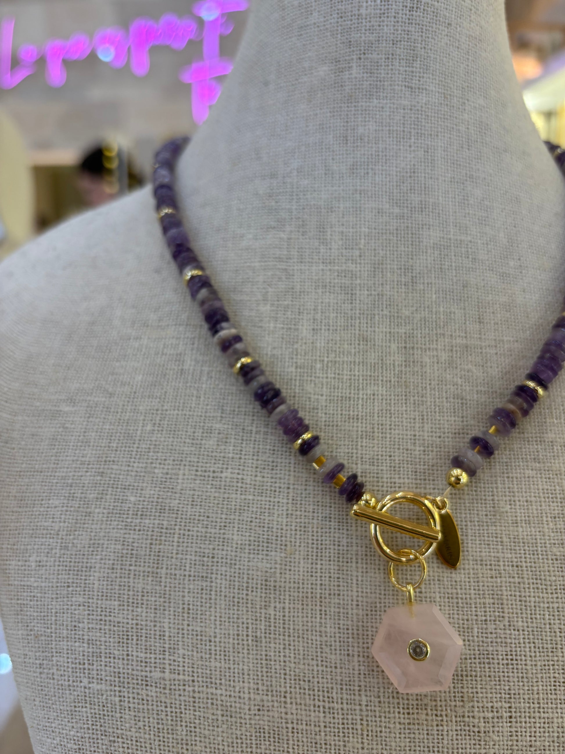 Côte d'Azur gemstone necklace detail shot with amethyst and rose quartz