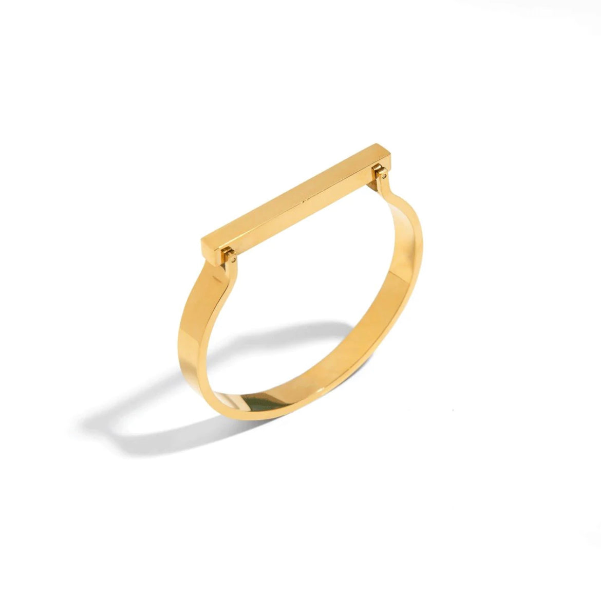 The bold bar golden bracelet boasts a striking design with a substantial gold bar, creating a visually prominent and luxurious accessory. Crafted gold plated,the bracelet radiates a sophisticated elegance, making it a standout piece for those seeking a statement accessory.

	•	Holiday jewelry sale
	•	Personalized jewelry Christmas
	•	Trendy holiday jewelry
	•	Affordable Christmas jewelry
	•	Luxury jewelry Christmas gifts
	•	Stocking stuffer jewelry
