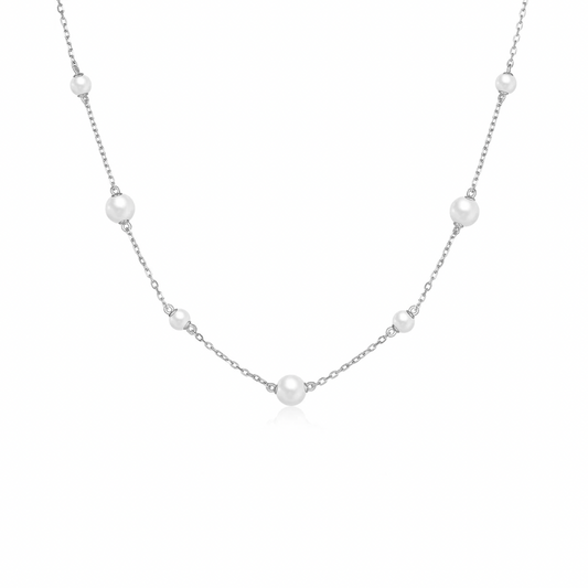 Indulge in the understated luxury of our DELICATE PEARL SILVER NECKLACE. 
Elegant and sophisticated, this .925 Sterling Silver necklace features delicate pearls that add a touch of refinement to any outfit. Bring a touch of classic beauty to your wardrobe with this exclusive piece.


Material: .925 Sterling Silver + 18K gold plated

Measurements: 14.80 + 2.00 in 