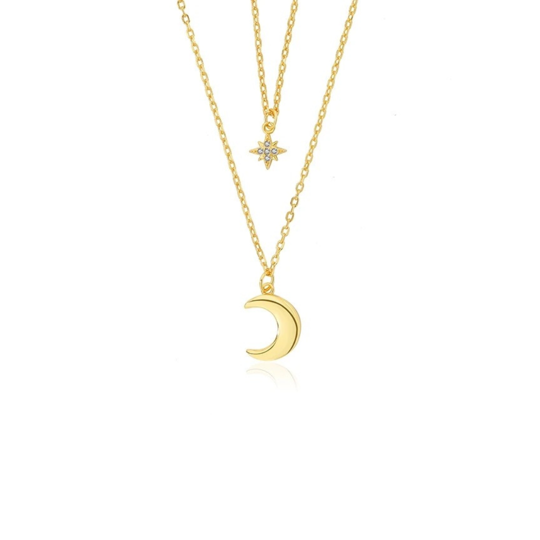 Shimmer in style with our DOUBLE LAYER SUN AND MOON GOLDEN NECKLACE.

A playful way to embrace the power of manifestation affirmations, this necklace features a double layer design with a sun and moon charm. 
Perfect for adding a touch of whimsy to any outfit! 

Unleash the power of your YOUniverse… and look HOT doing it. 


Material: 925 Sterling Silver + gold plated 18K

Measurements: 15.60 in

Height between layers with pendant: 1.80 in