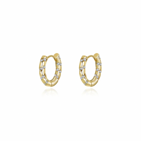 These gold hoops have a unique twist with their caramel-colored transparent design. Perfect for adding a touch of fun to any outfit. (No calories, we promise!)