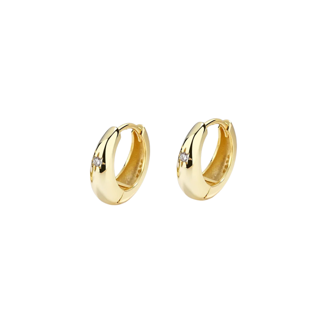 Get your ears' moneys worth with these delightful Kim Hoops. Their golden color adds a touch of luxury, while their playful design will surely make a statement.  Don't miss out on this unique addition to your jewelry collection!