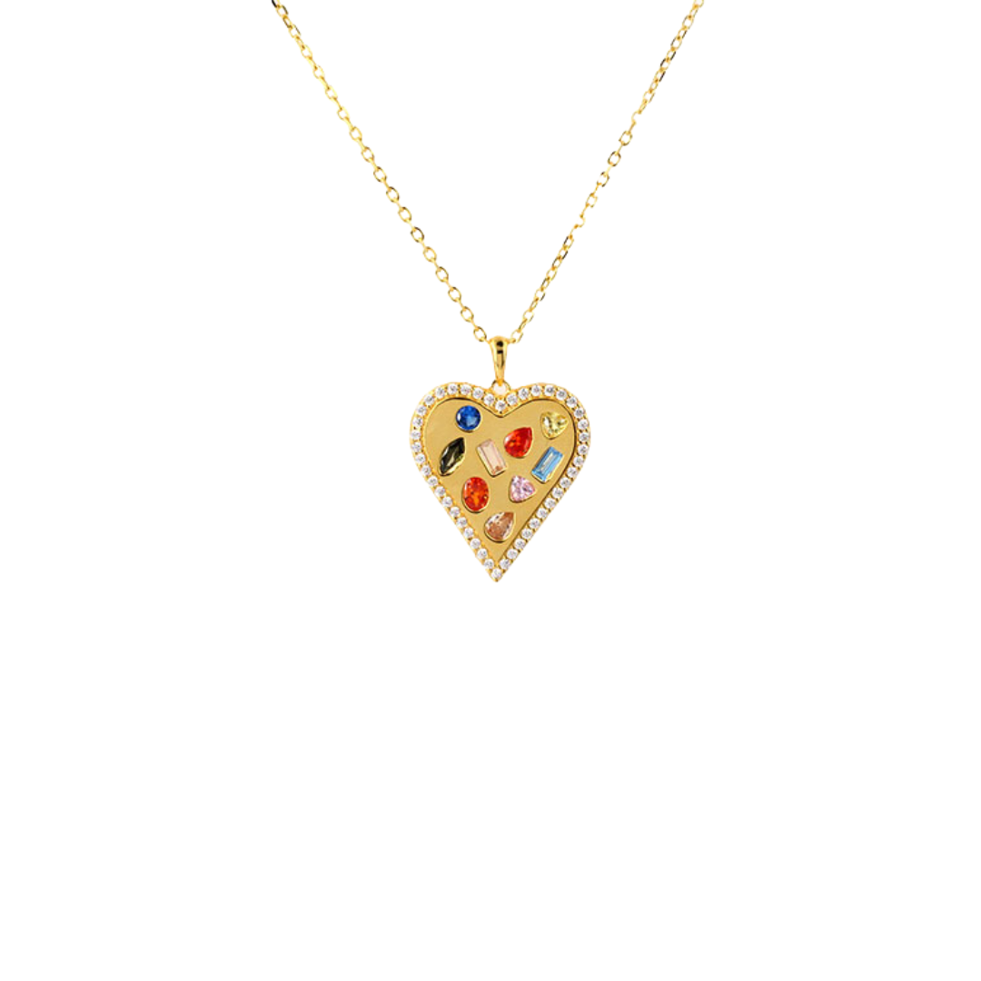 Fall in love with our Rainbow Figured Heart Necklace. 

This playful necklace features a rainbow colored heart pendant, adding a pop of color to any outfit. Share your love and show off your unique style with this quirky and fun necklace.

Perfect for those who love to stand out and make a statement (without trying too hard)!


Material: Sterling silver .925 + 18K gold plated

Measurements: 15.80 in + 2.00 in pendant: .95 x .80 in