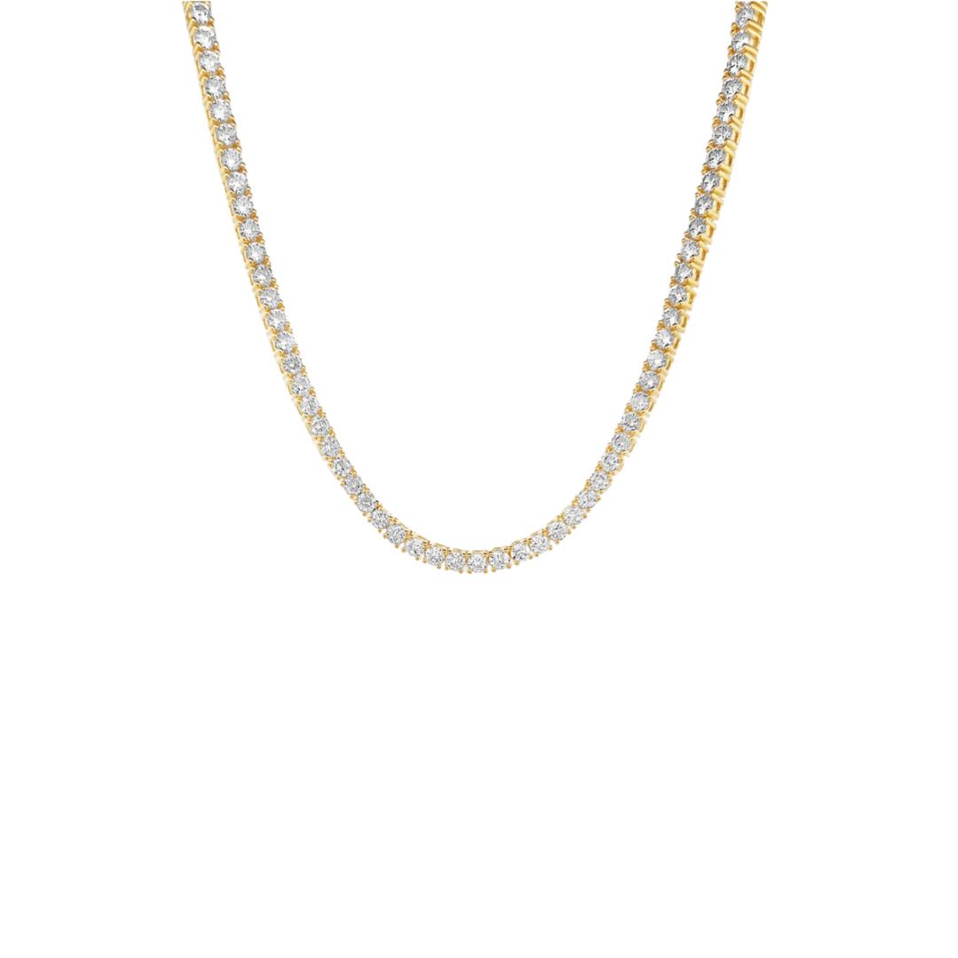 Score big with our Tennis Gold Chocker! This bold necklace is sure to make a statement on and off the court. With its elegant gold design, you'll be serving style all day long. Perfect for any tennis lover or fashionista looking to add some flare to their wardrobe. Serve up some serious fashion with our Tennis Gold Chocker!

Material: Sterling silver .925 + 18K gold plated

Measurements: 11.30 in + 4.00 in thickness: .15 in