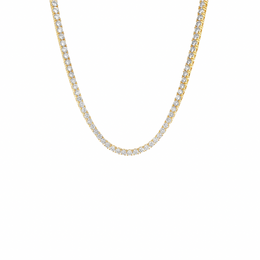 Score big with our Tennis Gold Chocker! This bold necklace is sure to make a statement on and off the court. With its elegant gold design, you'll be serving style all day long. Perfect for any tennis lover or fashionista looking to add some flare to their wardrobe. Serve up some serious fashion with our Tennis Gold Chocker!

Material: Sterling silver .925 + 18K gold plated

Measurements: 11.30 in + 4.00 in thickness: .15 in