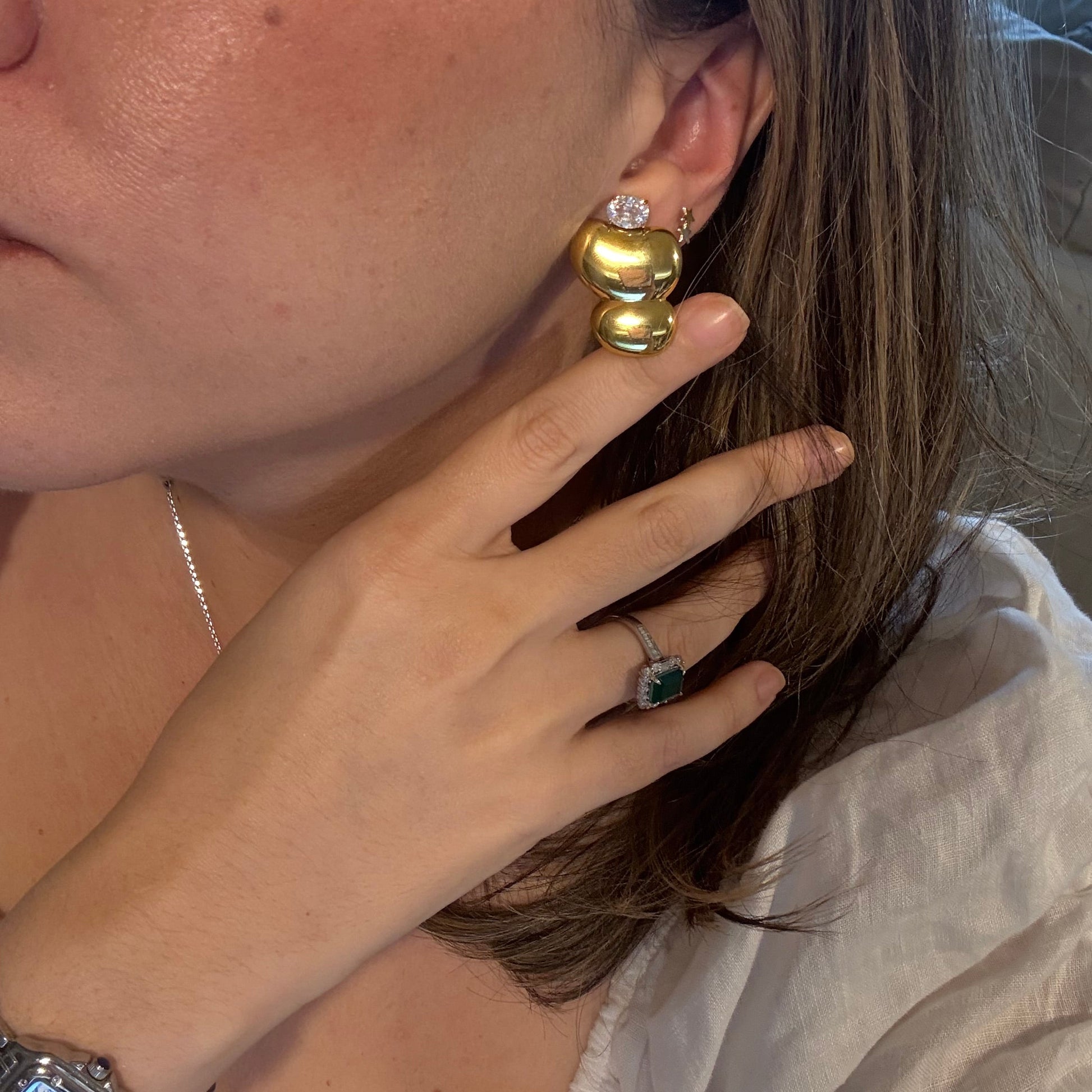 Chunky double heart drop earrings with zircon stud, side view