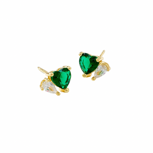 Indulge in the luxury of our GREEN HEART SPARKLE STUDS.

Exquisitely crafted with stunning green hearts, these studs add a touch  to any outfit.

Sparkling with every movement, they make a perfect gift for your loved one or a luxurious treat for yourself.


Material: 925 Sterling Silver + gold plated 18K

Measurements: .40x .30 in