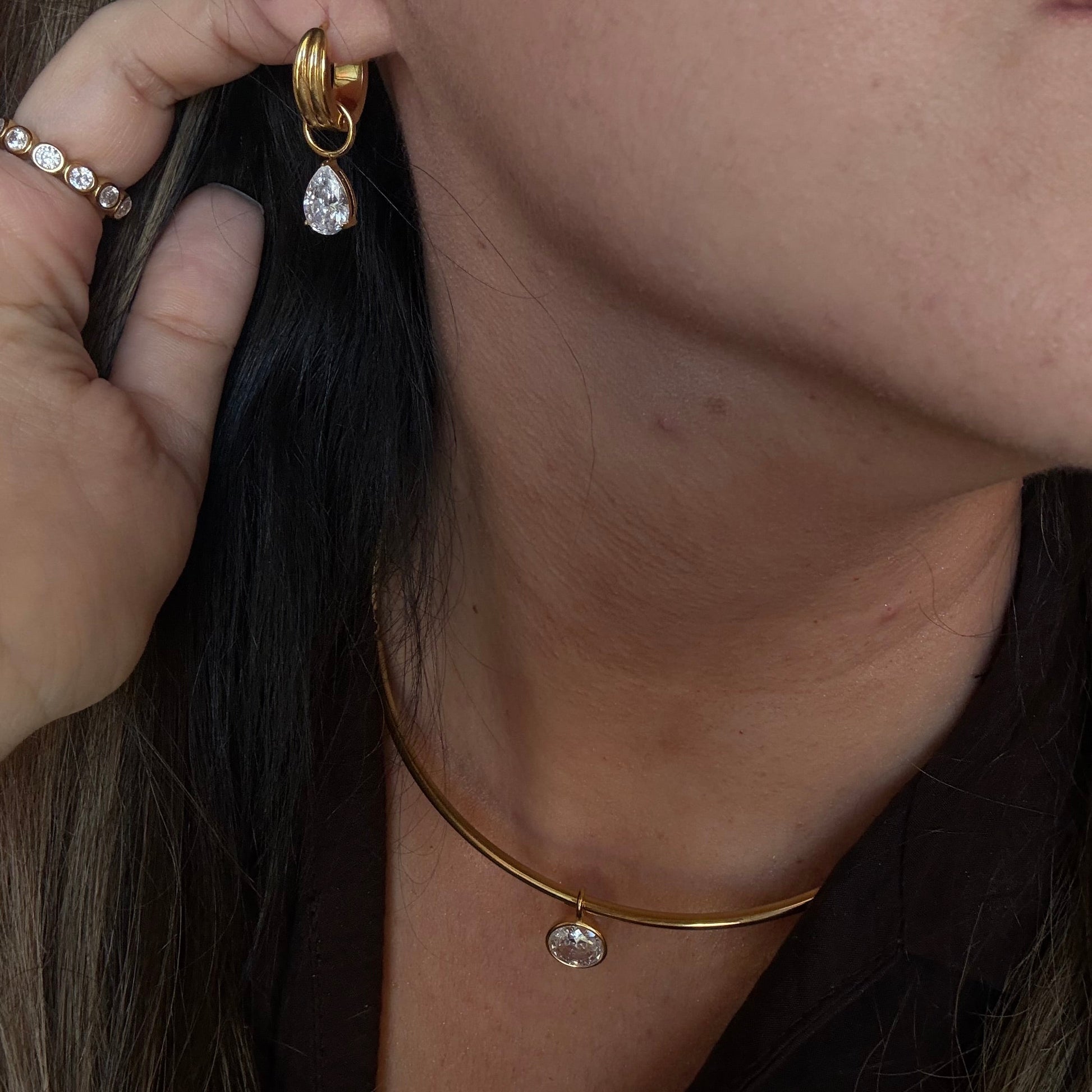 Brooke drop zircon earrings styled with layered jewelry