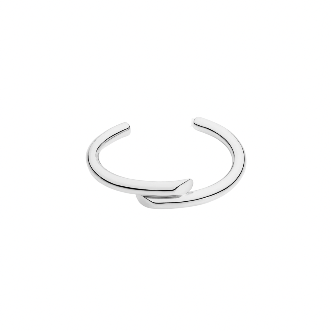 This dual silver bracelet is crafted from high-quality silver and features a sleek and modern cuff design. The perfect accessory for any outfit, this bracelet adds a touch of elegance and style. Made with precision and craftsmanship, it is both durable and stylish, making it a must-have for any jewelry collection.

Material: 100% brass  and 18K gold plated

Measurements: 2.65 x 2.2 in

 