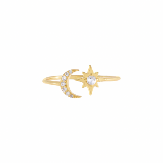 This MOON AND STAR RING combines celestial elements to create a unique and elegant accessory. Crafted with precision and detail, this ring is sure to catch the eye and add a touch of sophistication to any outfit. 
Made with quality materials, this ring is the perfect affirmation of your personal style. 

Unleash the power of your YOUniverse… and look HOT doing it. 

Material: .925 Sterling Silver + 14K gold plated
Adjustable