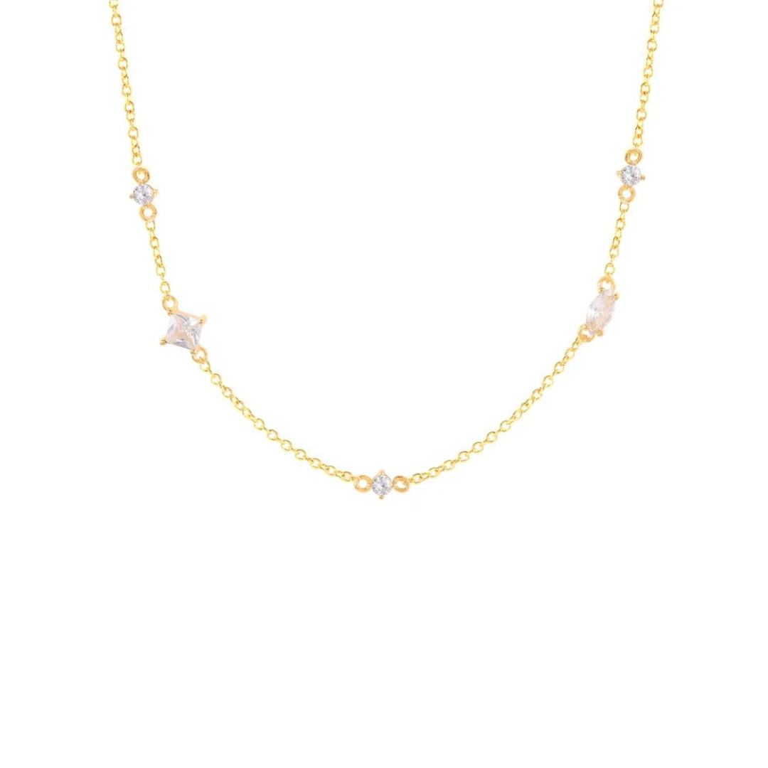 This exquisite necklace features a clear, faceted centerpiece that sparkles in the light, surrounded by delicate, intricately designed settings. Stunning accessory for any occasion.


Material: 925 Sterling Silver + 18K gold plated

Measurements: 16.90 + 1.90 in

 

 