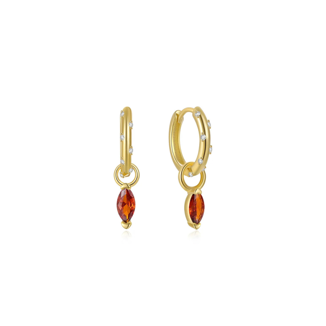 These SPARKLE OVAL RED CHARM HOOPS add a touch of elegance and sophistication to any outfit. The sparkling red charm design adds a pop of color and the oval shape creates a flattering silhouette. Made with high-quality materials for long-lasting wear. Elevate your style with these stunning hoops.


Material: .925 Sterling Silver + 14K gold plated

Measurements: .50 in x .50 in 

pendant: .25 in x .25 in
