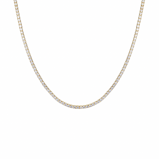 Elevate your jewelry game with our TENNIS GOLDEN NECKLACE! This classic trend will add a touch of elegance to any outfit. A must-have accessory for any fashion-forward individual.

Classic, classic, classic. Everyone needs the perfect tennis necklace in their layering game.

Material: Sterling silver .925 + 18K gold plated

Measurements: 16.5 in thickness: .10 in