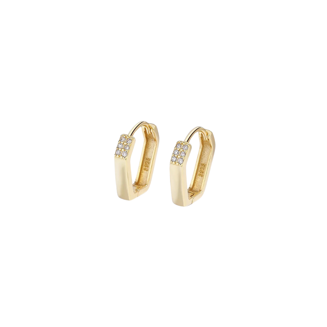 Transform your outfit with our stunning Oval Squared Top Gold Hoops! These elegant earrings add a touch of luxury to any look. Made with high-quality gold, their unique oval squared top design sets them apart from traditional hoops. Elevate your style and make a statement with these beautiful and versatile earrings.