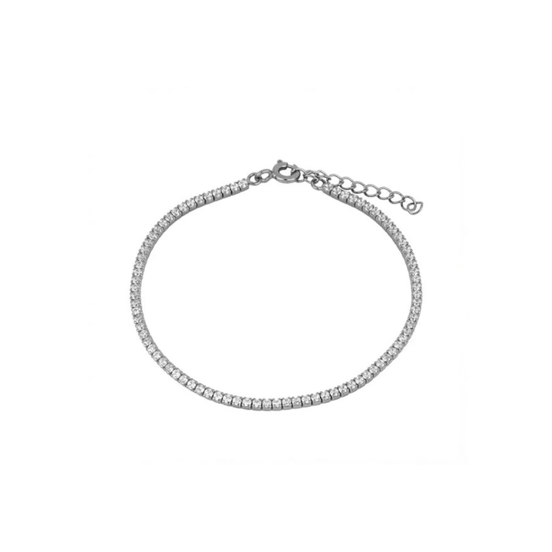 Hit the fashion court with our trendy yet classic Tennis bracelet. Serving up a chic look that will elevate any outfit, this necklace is sure to be a smash hit. Durable and stylish, it's a grand slam of a piece. 

A classic everyone needs the perfect tennis bracelet in the stacking game.

Material: .925 Sterling Silver + 18K gold plated
Measurements: 6.5 in + 1.00 in