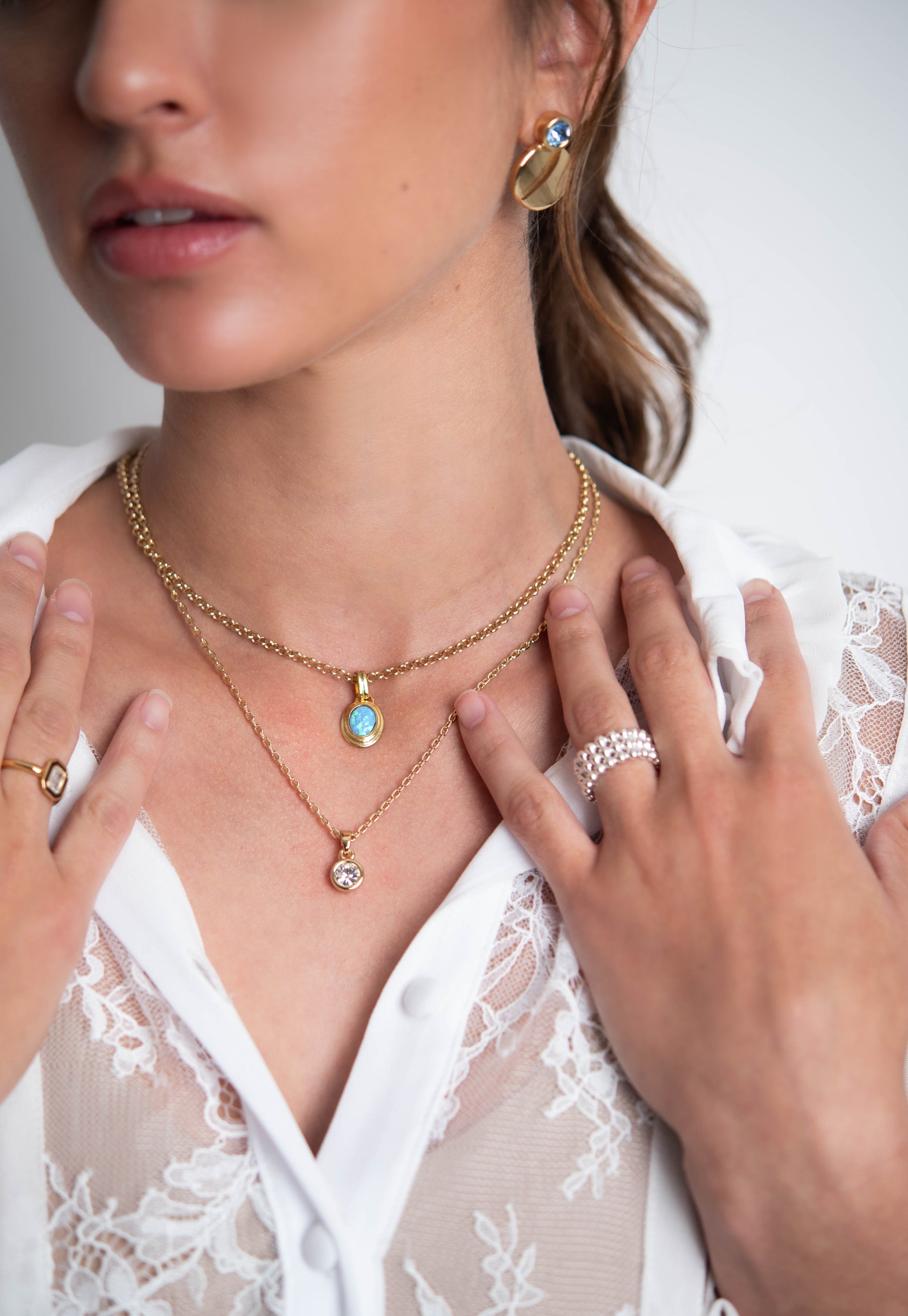 Nerea baby blue double disc earrings detail shot