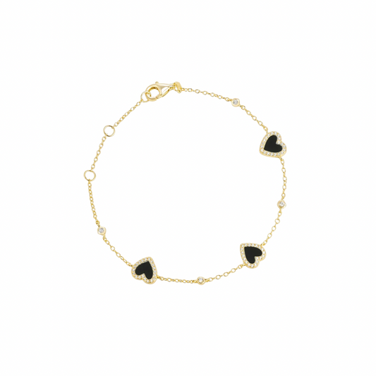 Add a touch of cuteness and elegance to your outfit with our HEART ONYX BRACELET! Made from gorgeous onyx, this bracelet features a charming heart design that will surely steal hearts (pun intended). Perfect for any occasion, this bracelet is a must-have for any jewelry collection.


Material: Sterling silver .925 + 18K gold plated

Measurements: 7.60 in 
