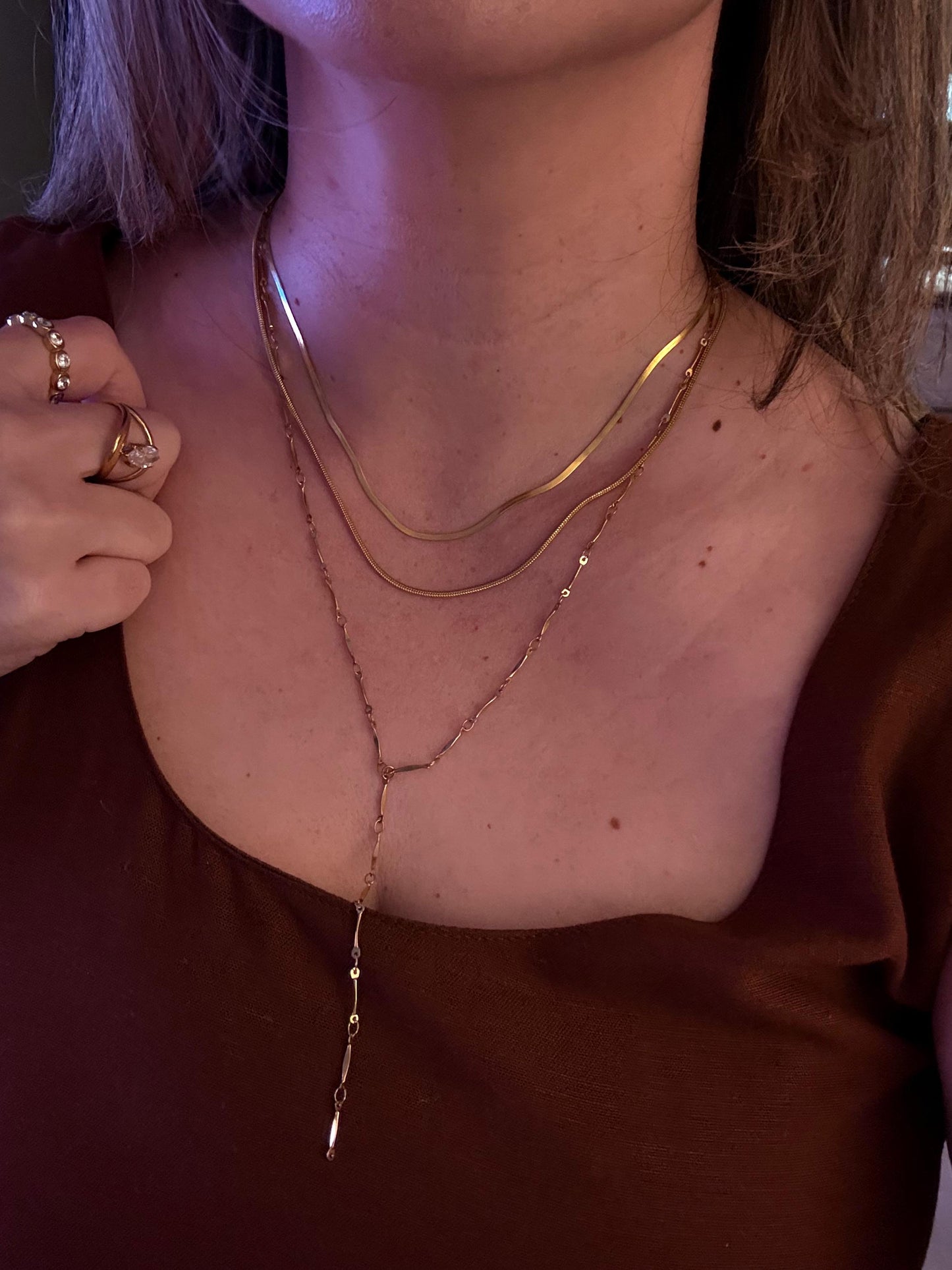 Gold layered Y necklace set showing three chains together