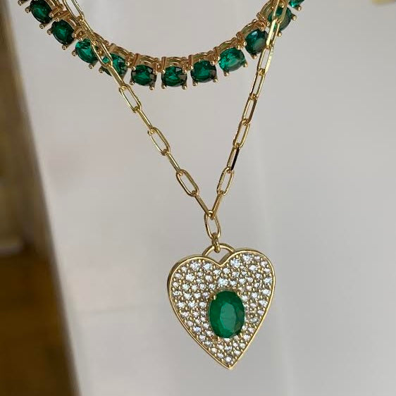 Add a touch of love to your look with our EMERALD HEART FIGARO NECKLACE. 

This stunning necklace features a delicate figaro chain and a heart-shaped emerald pendant that adds a touch of whimsy to any outfit.

Perfect for adding a pop of color and charm to your look. Wear it alone or layer it with other pieces for a unique and playful look. 


Material: Sterling silver .925 + 18K gold plated

Measurements: 17 in + 1.10 in pendant : .80 x .70 in